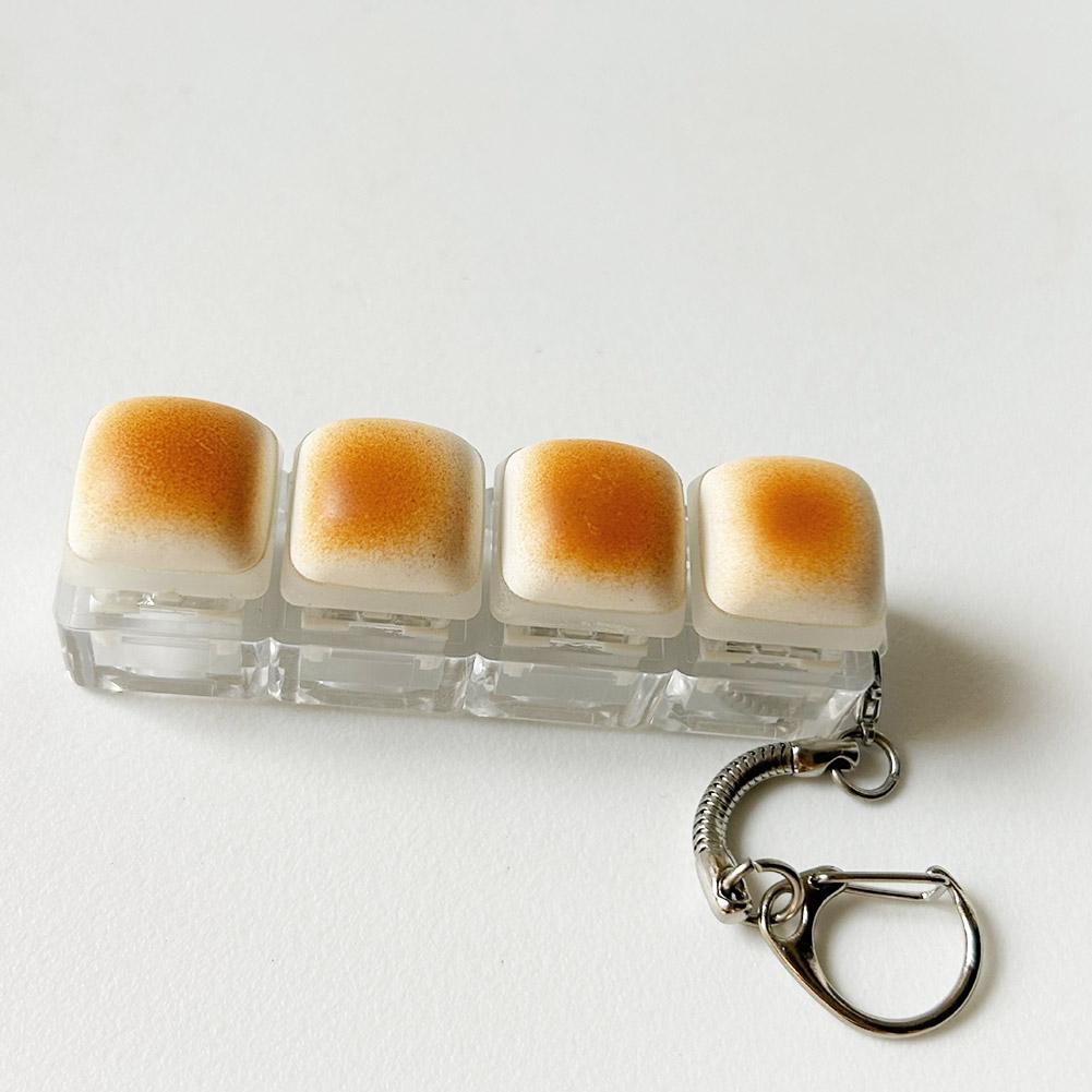 Push Button Anti-Stress Toy "Caramel Bread" Backpack Hanger, Plastic Finger Prank Office Toy