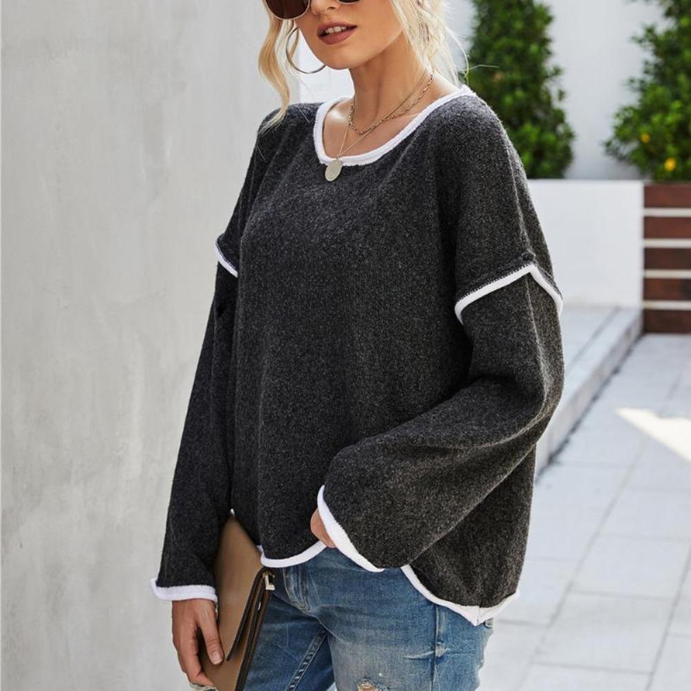 Женский вязаный свитер с круглым вырезом и кисточкой на спине — фото 16