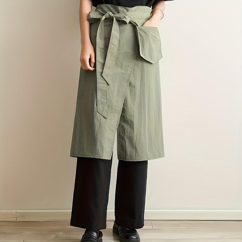 

1 шт. Фартук половинной длины с разрезом и поясными завязками, которые можно завязывать спереди или сзади, и множеством карманов для удобной работы. Нейлон зелёный