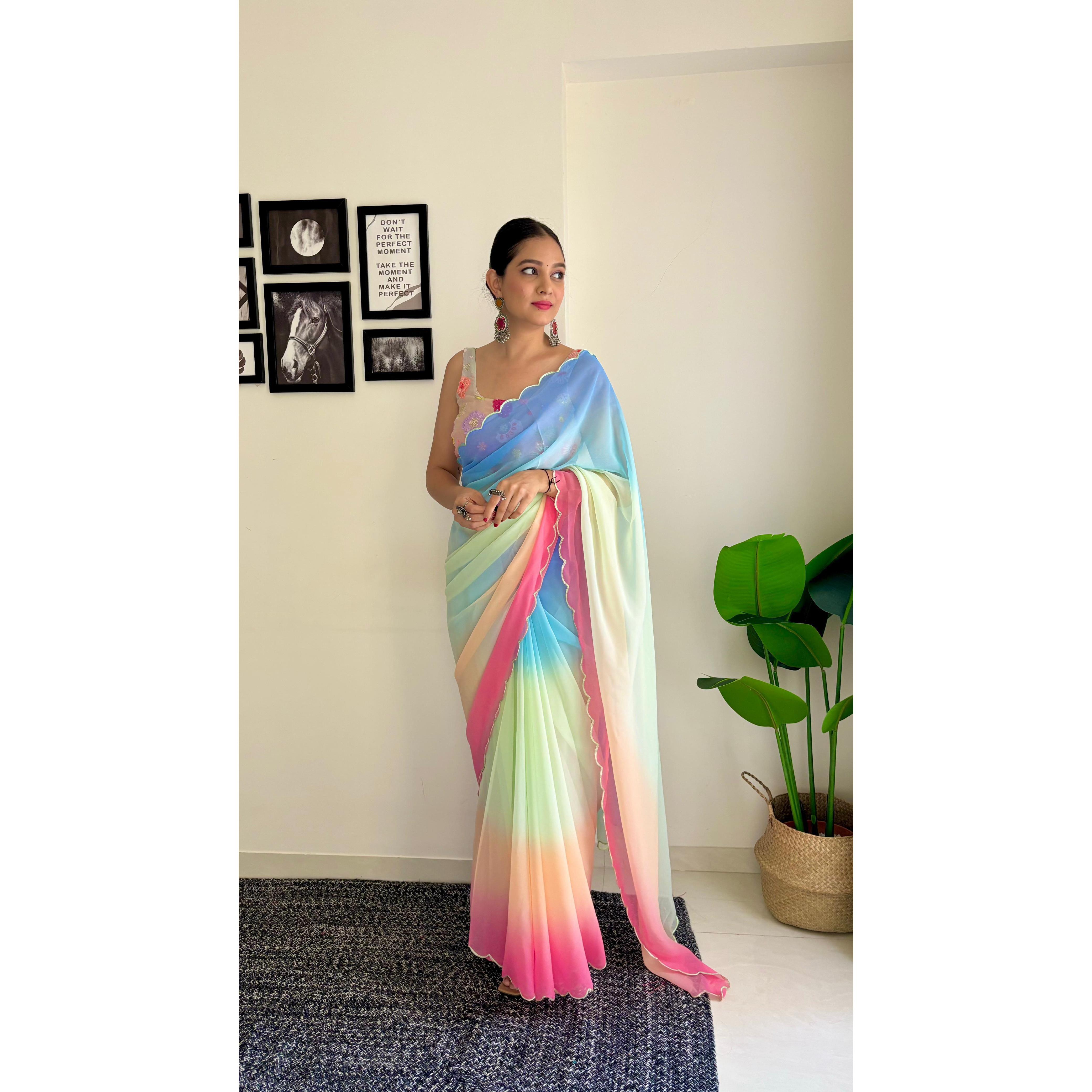 

Элегантность драпировки в любом оттенке! Наше завораживающее сари с замысловатыми украшениями готово привлечь к себе всеобщее внимание.