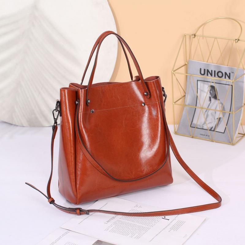 

«Высококачественная женская сумка-ведро из натуральной кожи — европейская и американская мода, большая вместимость, на одно плечо или в стиле почтальона» 31*14*32cm