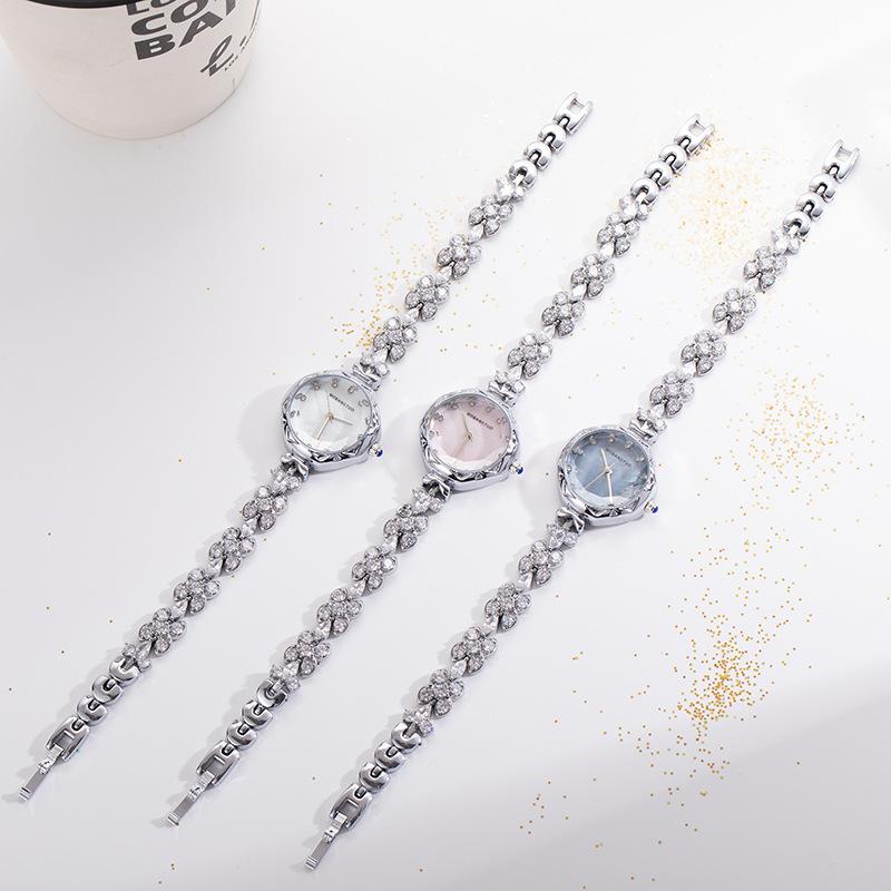 Light Luxury Diamond Cross Flower Bracelet Watch Women's Watch Niche High-end Fashion Versatile Waterproof Quartz Watch