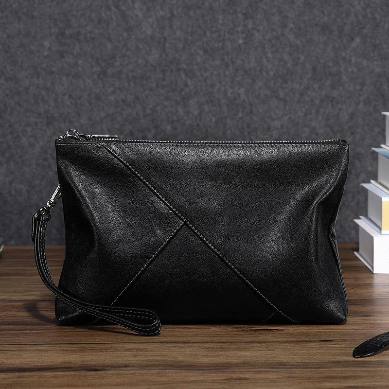 

Сумка-конверт из натуральной кожи с большой ручкой и верхним слоем из коровьей кожи чёрный