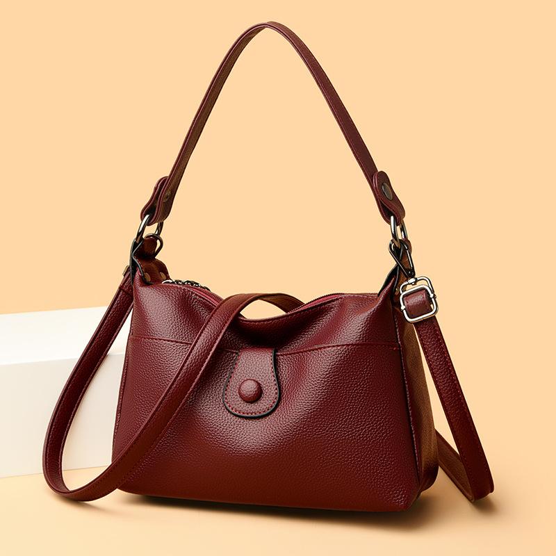 O geantă la modă și versatilă de mare capacitate, cu un singur umăr, din piele moale