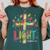Christian Christmas Shirt Be The Light Inspirational Christian Shirt Colorful Cross Xmas Shirt For Women Bible Verse Scripture Christmas Tee