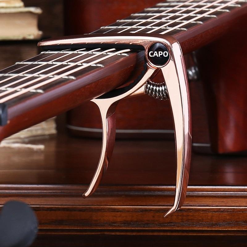

Guitar Capo Metal 1PCS Aluminum oy Guitar Tuner Clamp Professional Key Trigger Capo for Acoustic Electric Musical Instruments