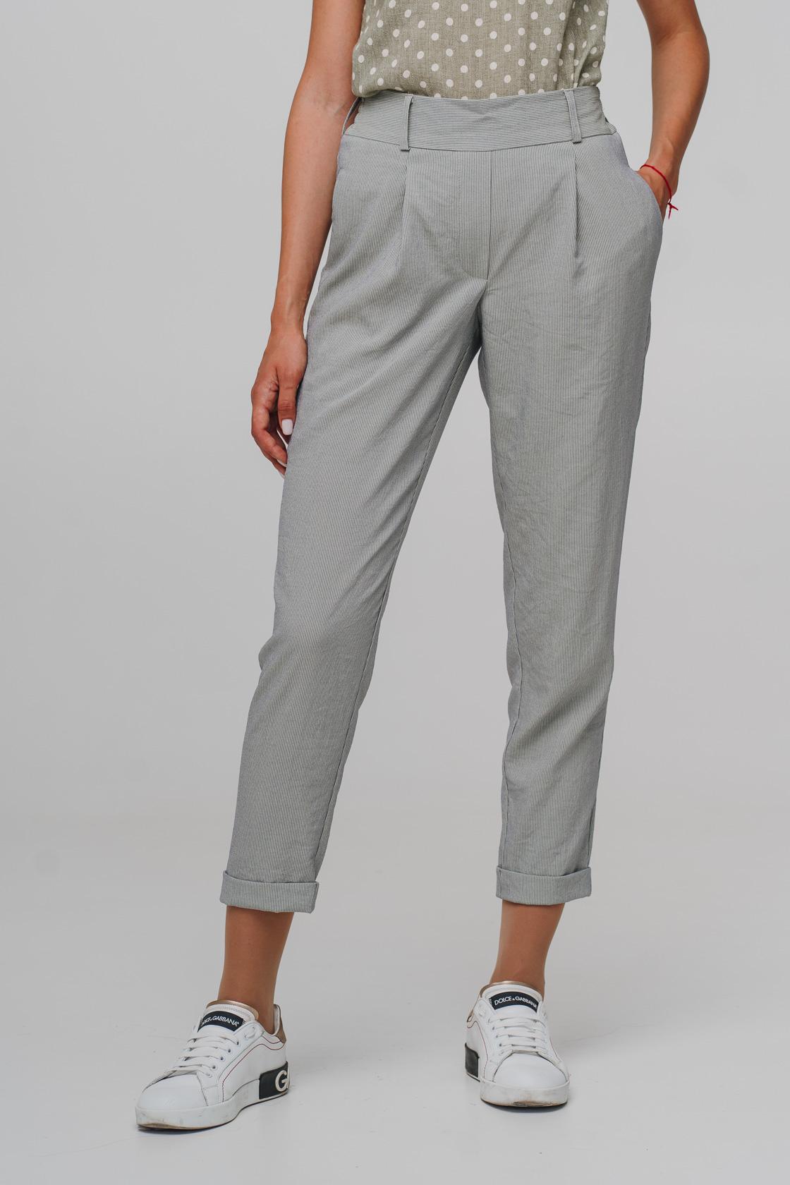 

Легкі укорочені штани на гумці із защипами різні кольори 38 темного кольору морської хвилі