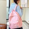 Mochila mochila secundaria chicas corazón de niña atmósfera lunares lazo versátil alto valor estudiante femenina mochila secundaria