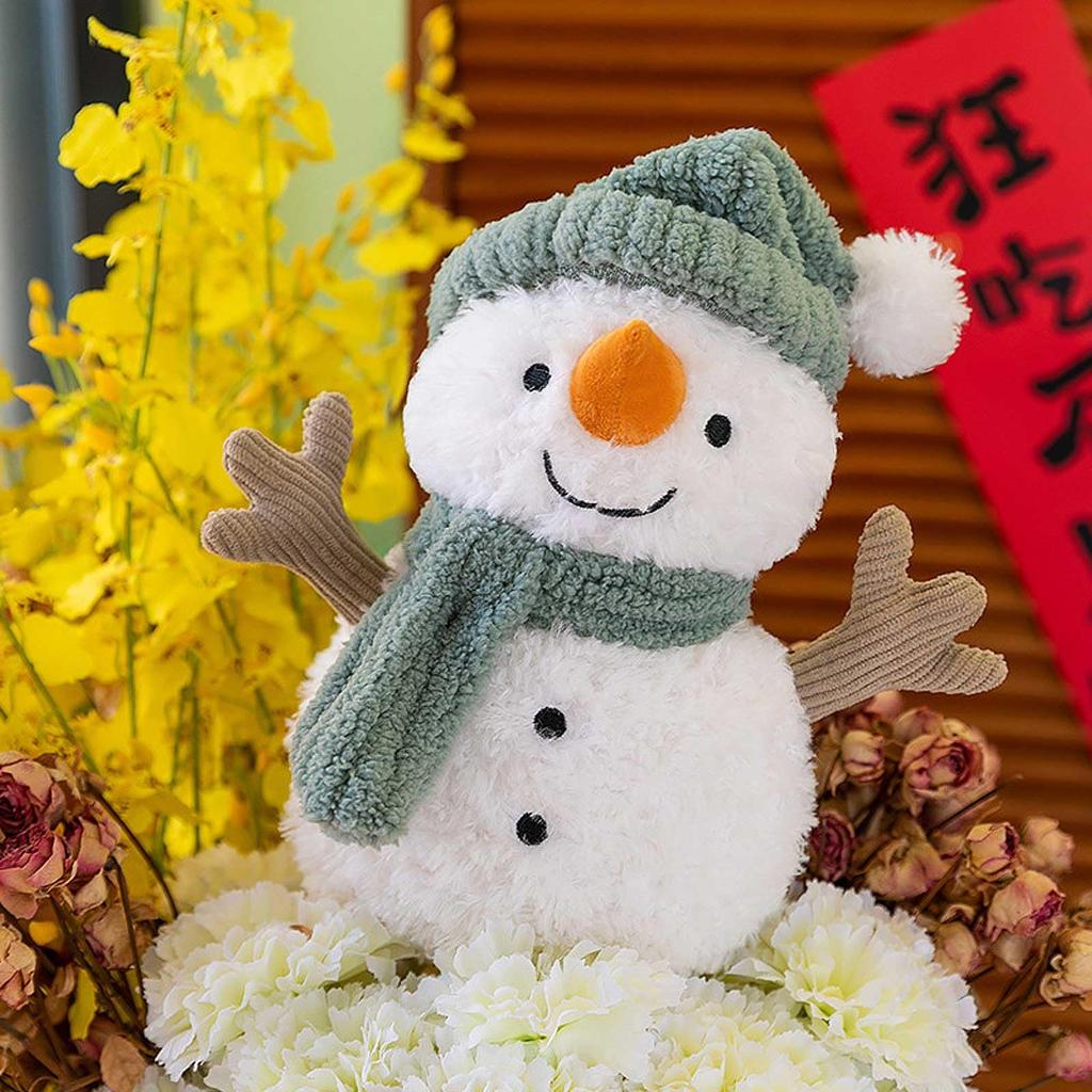 Cute, fluffy Christmas snowman plush toy cushion with a hat and scarf. Soft to the touch, perfect for kids and adults. A great birthday or Christmas