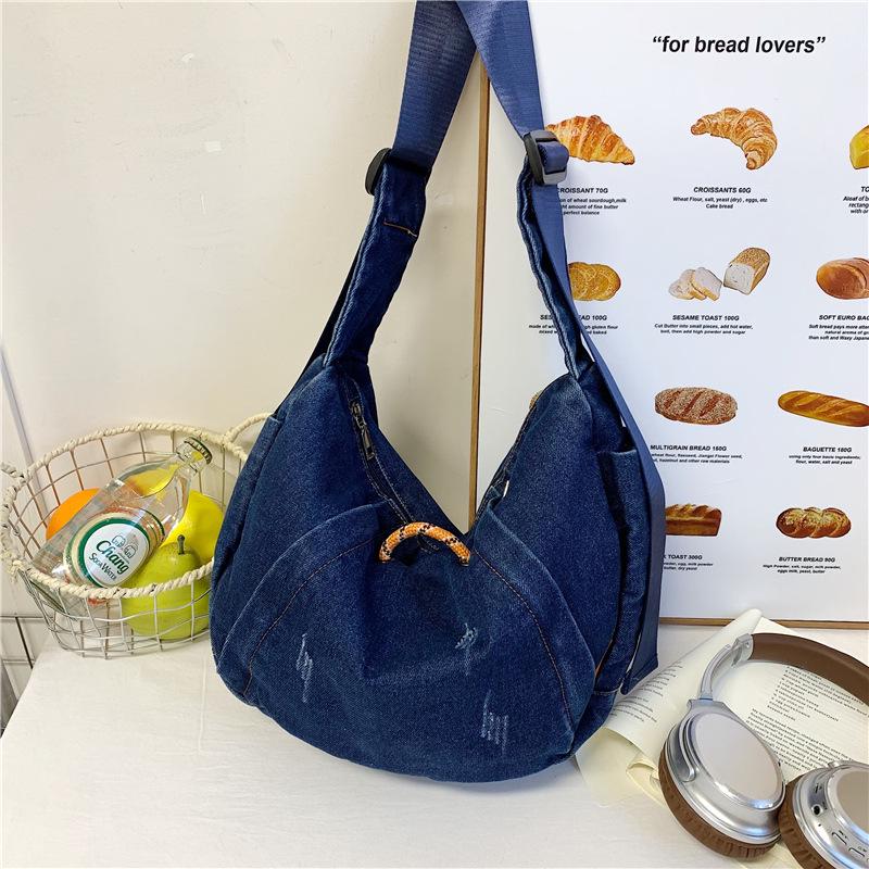 

Trendy Denim Dumpling Bag: Stylish, Versatile, Large-Capacity Shoulder & Crossbody Bag for 2026 Fashion.