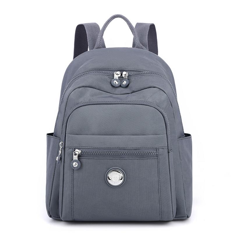 

Модный рюкзак Женский рюкзак нового стиля Нейлоновая ткань Высококачественная сумка Легкий для поездок на работу Женский рюкзак Дорожная сумка 27*14*34cm