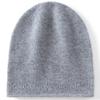 Un gorro de punto cálido y simple de cachemira sin costuras para otoño e invierno, nuevo para hombre y mujer, con protección para las orejas y el frío