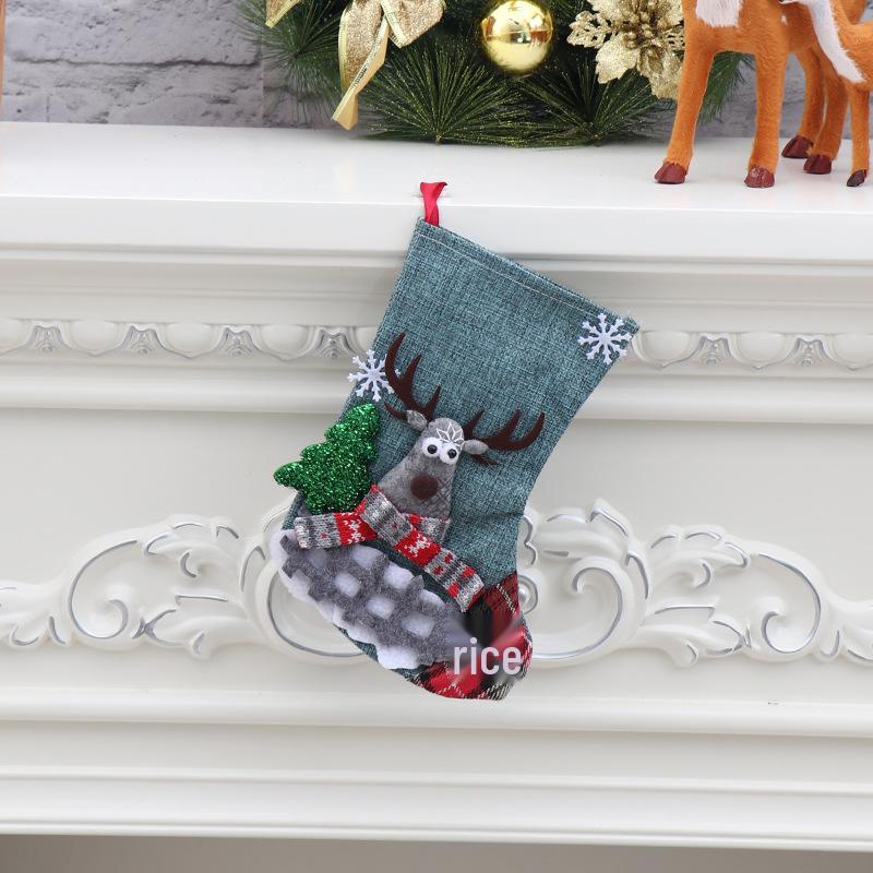 Sacchetto regalo calza di Natale media con decorazione di Babbo Natale e Pupazzo di Neve