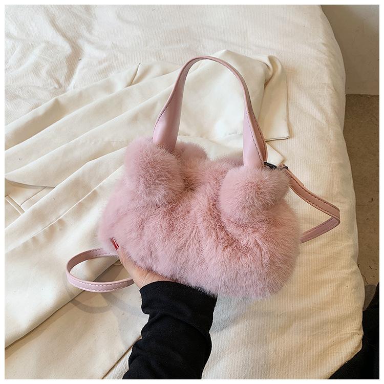 

Autumn and winter 2025 new pleated handbag bag women s super fire shoulder crossbody plush bag high texture niche bucket bag розовый