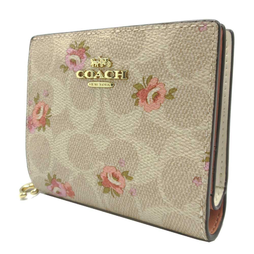 

Coach FCAR14 Bifold Wallet in Sand Multi Signature Floral Print with C Charm Snap and Round Zip Closure, Women s [Outlet] [Brand] [Used]
