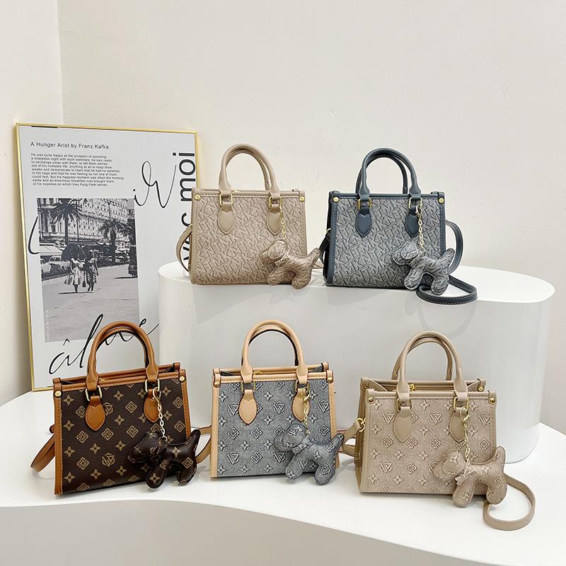 New high-end fashion contrasting color commuter bag portable shoulder oblique span women's bag