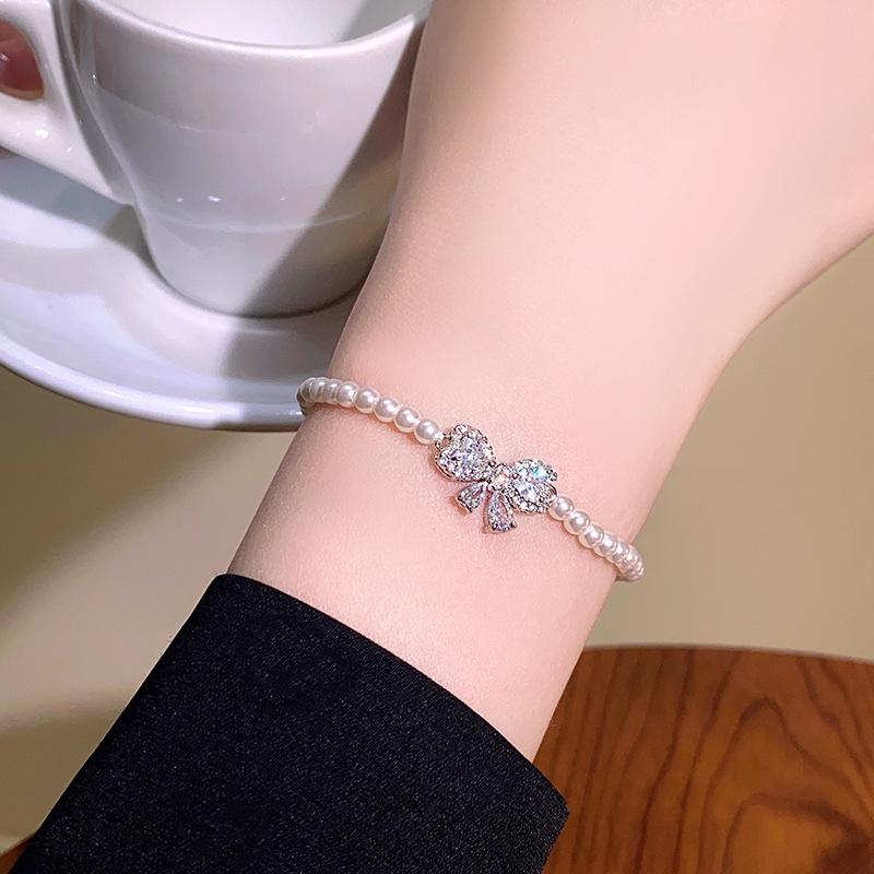 Elegant Pearl & Diamond Beaded Bow Bracelet - Chic, Versatile, and Luxurious Hand Jewelry
