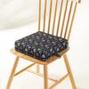 Portable waterproof booster seat cushion for babies, perfect for outdoor use.