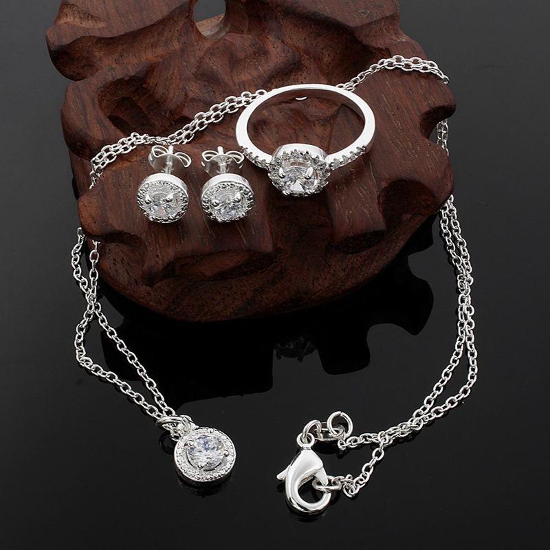 Versilbertes Schmuckset: Kupferkette, Ring & Ohrringe mit Zirkon - Perfekt für romantische Paare