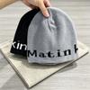 Hat women's autumn and winter warm fashion letter pullover hat young men and women couples street tide with melon rind cold hat