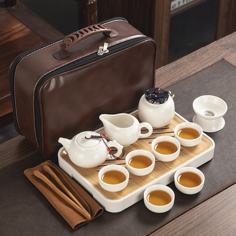 Travel ceramic Kung Fu tea set, tea tray, a full set of portable storage bags, practical business gifts for customers