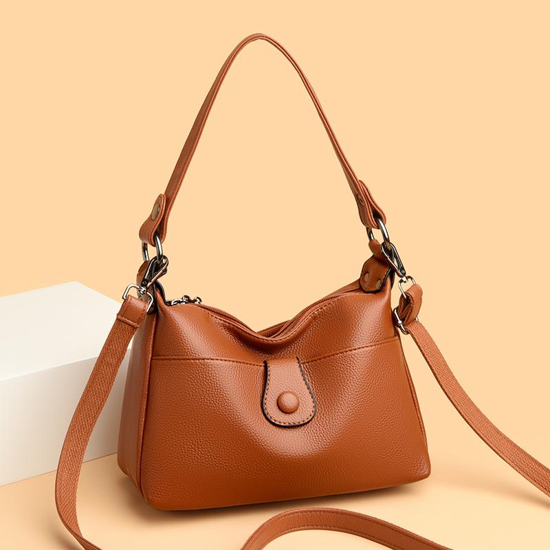 O geantă la modă și versatilă de mare capacitate, cu un singur umăr, din piele moale