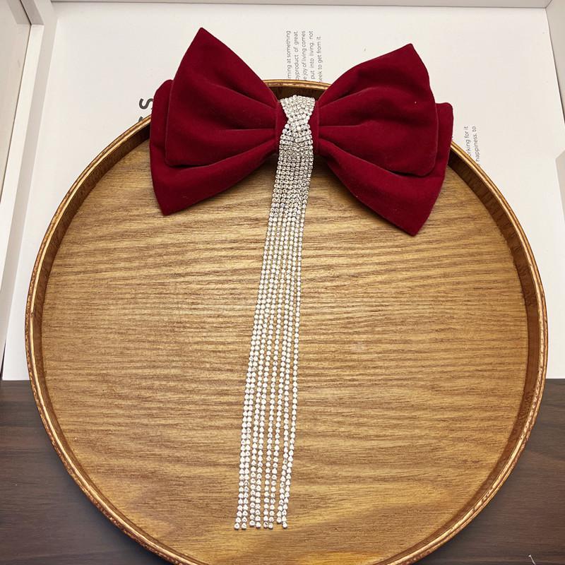 

Элегантная бархатная заколка-бантик с бриллиантовыми кисточками - свадебный аксессуар для волос
