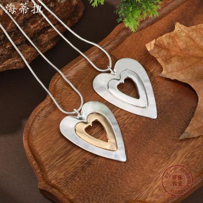 Nowy piaskowy srebrny jasny srebrny, jasne złoto kontrastowy kolor ażurowe serce długi wisiorek, damski wysokiej klasy naszyjnik długi w kształcie serca