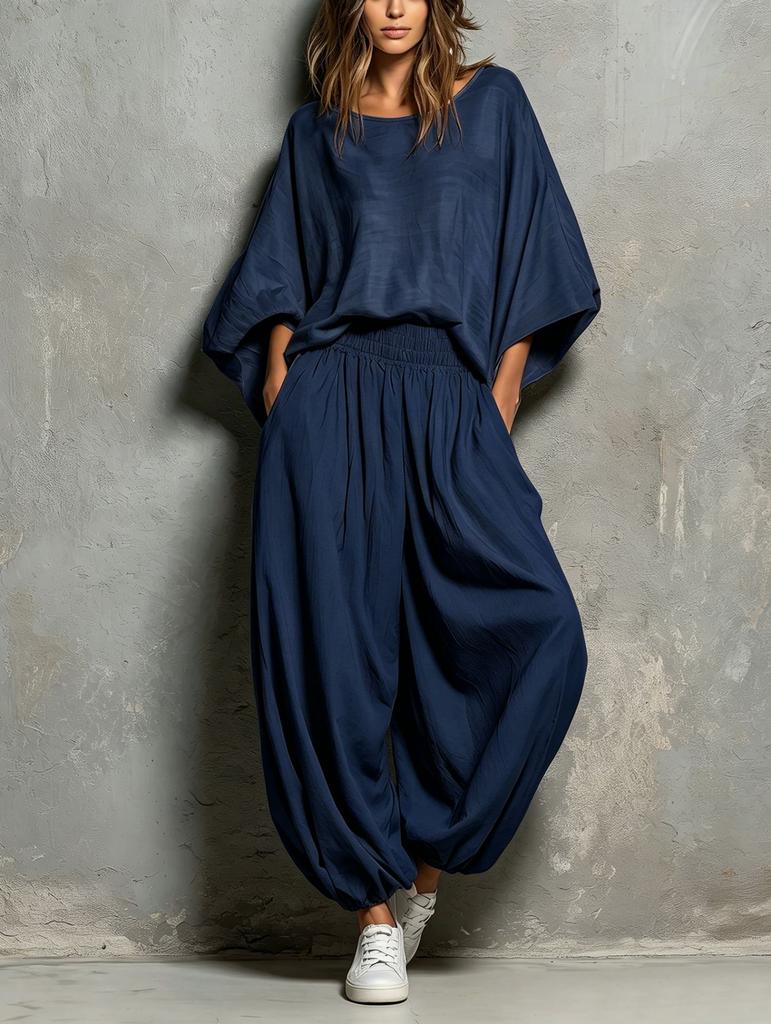 European and American women's clothing 2026 autumn and winter new fashion casual round neck loose top wide leg pants two-piece set