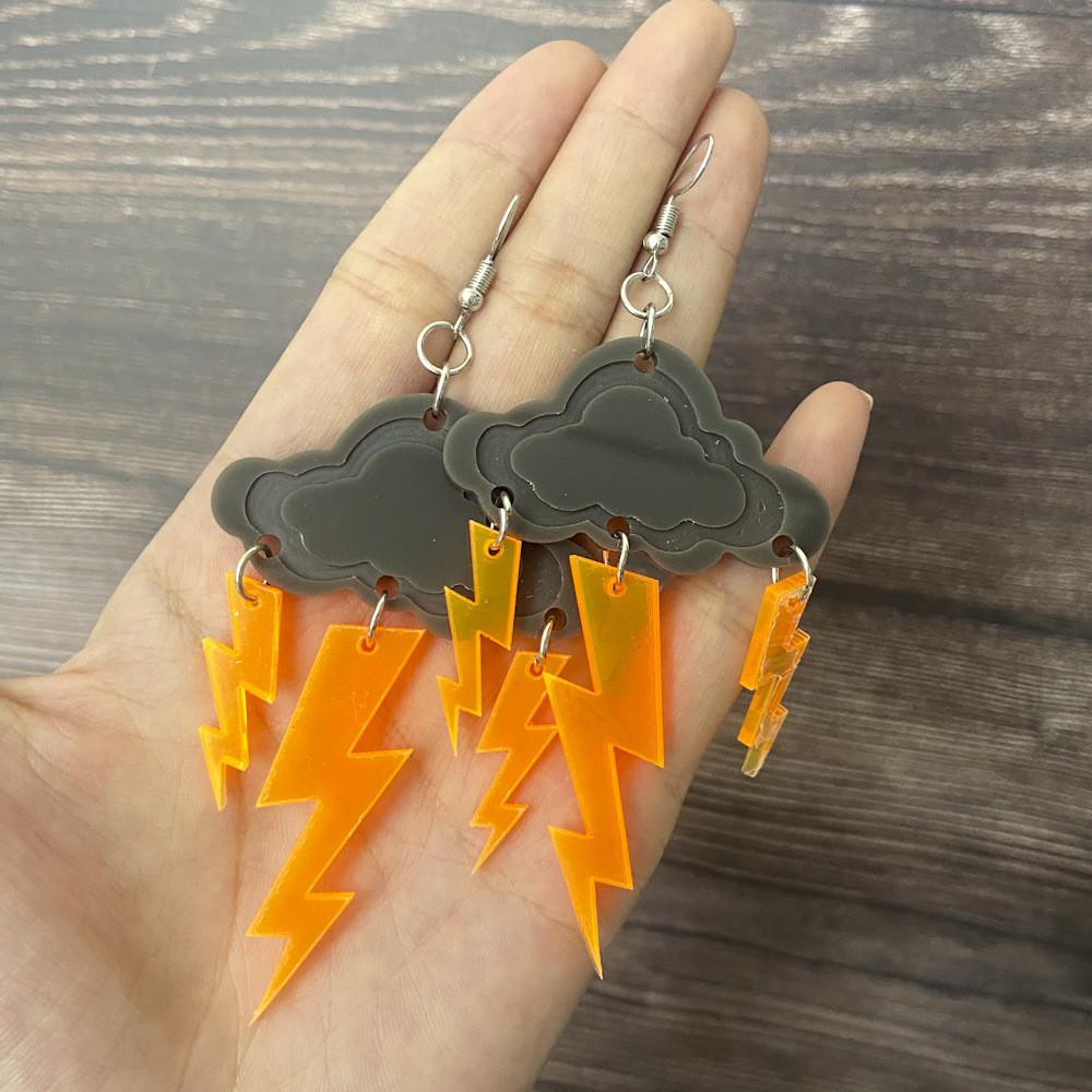 

Асимметричные серьги «Молния шик» идеально подходят для летней моды 2023 оранжевый