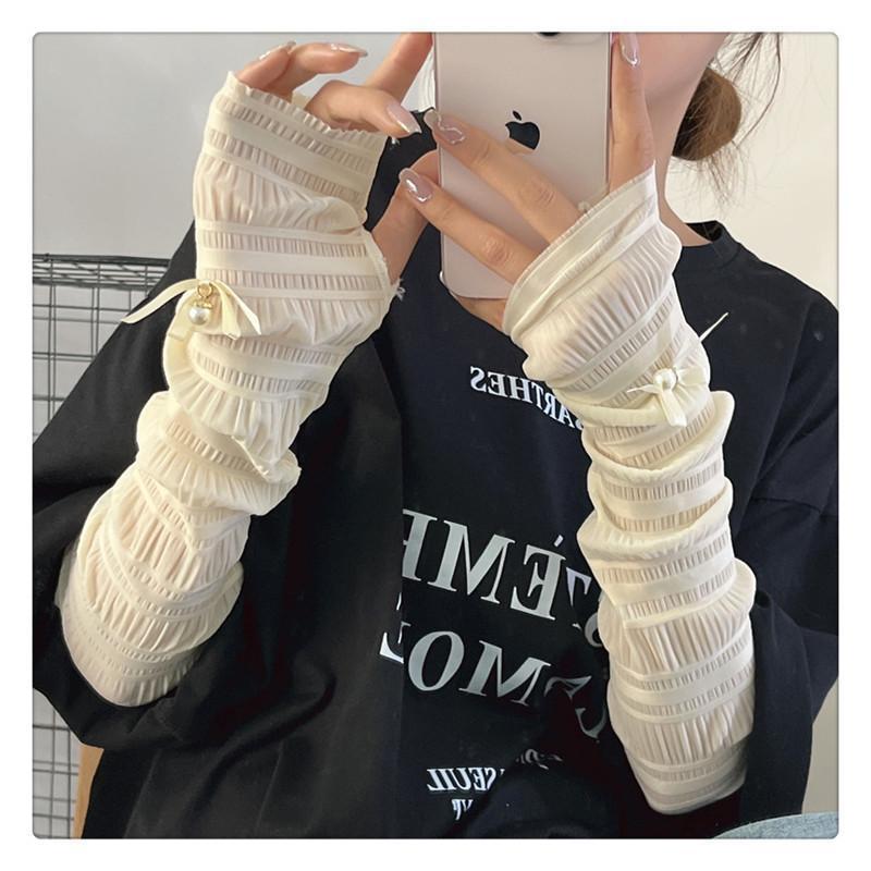 

Women’s Summer Outdoor Lace UV Protection Arm Sleeves with Pearl Bow, Ice Silk Cooling Sun Sleeves, Elegant Breathable Arm Covers for Driving, Cycling