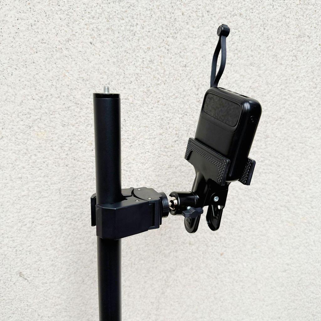 Mobile Streaming Power Bank Holder: 360° Rotation Clip with Metal Ball Head, Tripod Extension, and Strong Clamp.