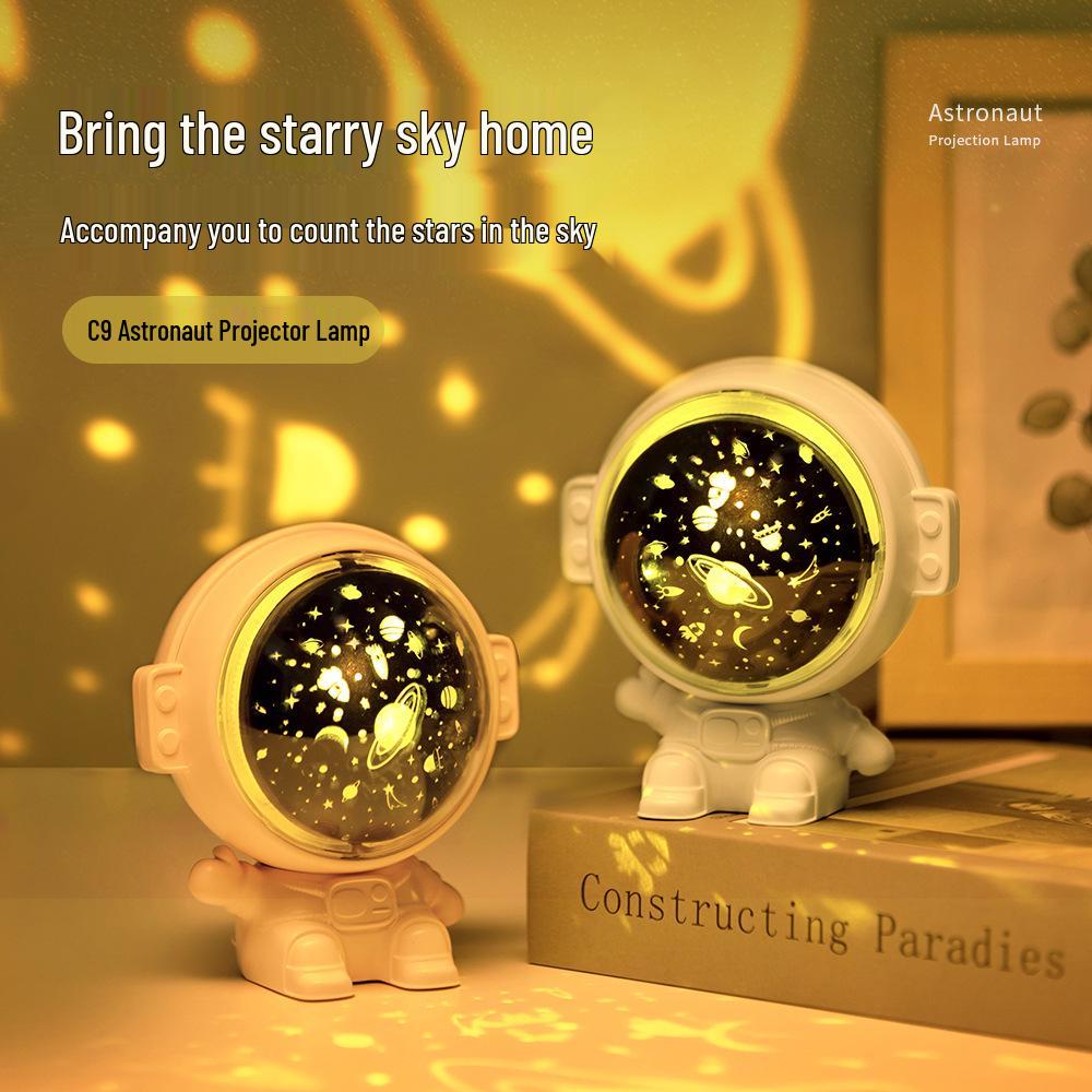 Spaceman Starry Sky Projector: Rotating Night Light & Music Lamp for Kids' Bedrooms