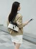 Niche High-End LP27 Women's Luxury Cowhide and Canvas Leather Shoulder Makeup Bag with Large Capacity.