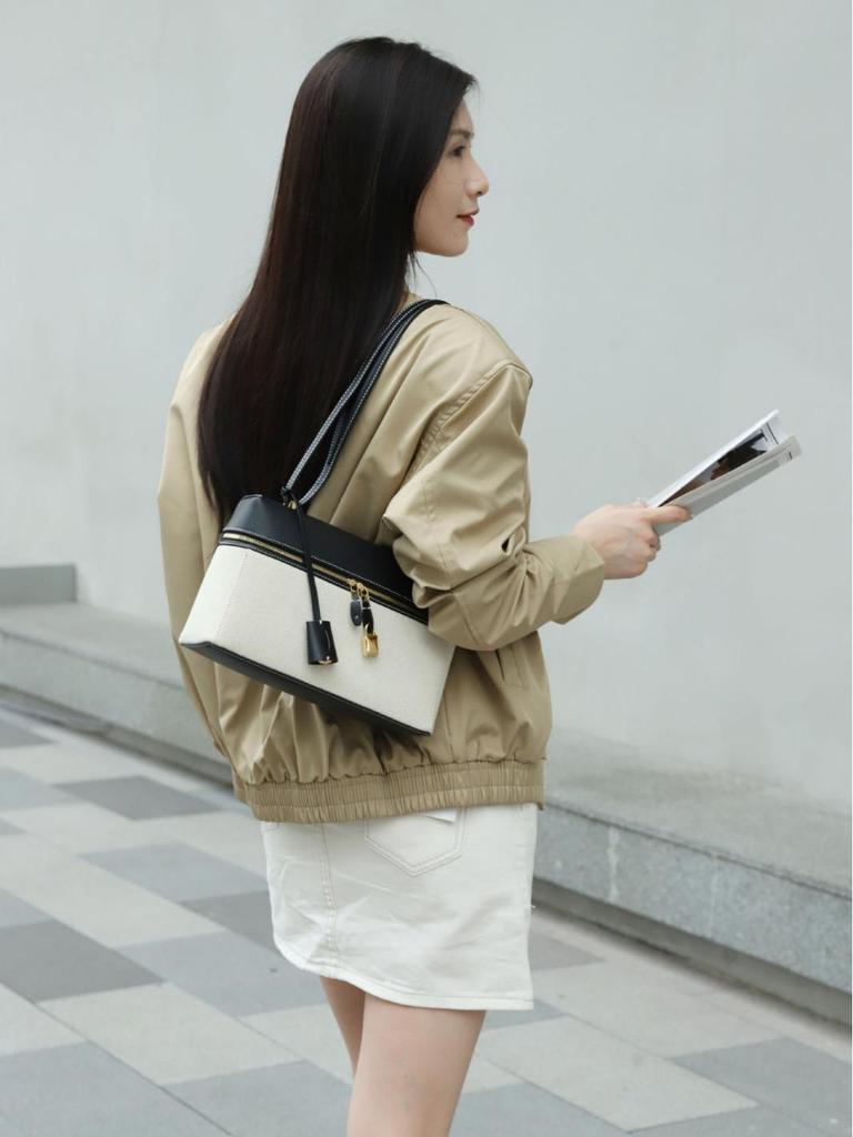 Niche High-End LP27 Women's Luxury Cowhide and Canvas Leather Shoulder Makeup Bag with Large Capacity.