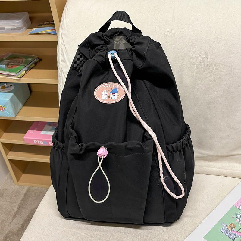 

Children s schoolbag Elementary school student Drawstring Girls Junior high school high school college backpack чорний