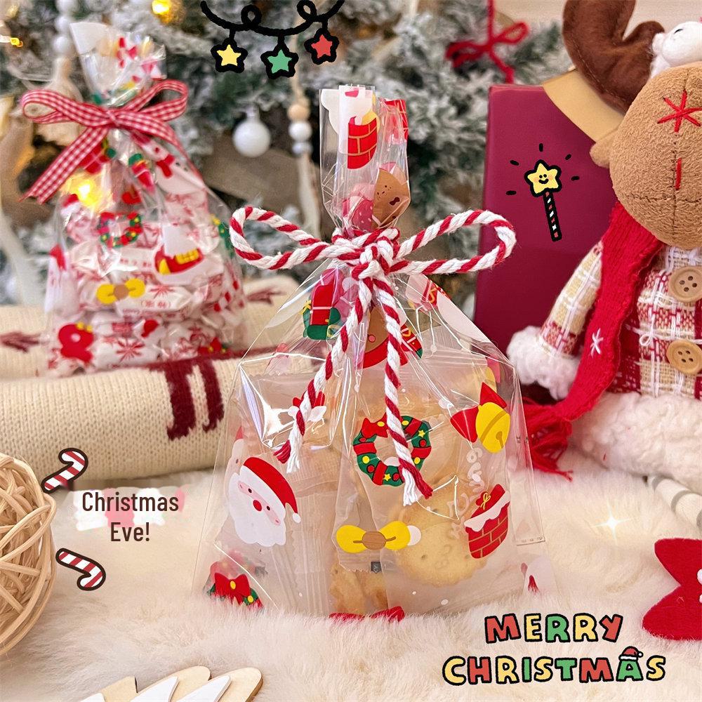 Sac cadeau transparent de bonbons aux pommes pour la veille de Noël, pour les couples