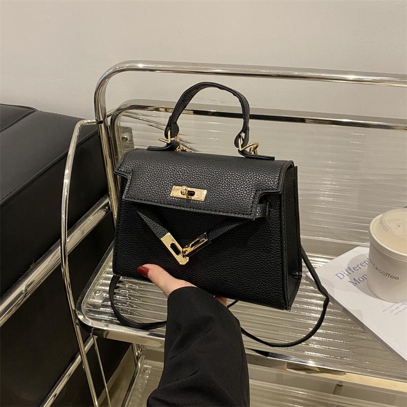 

This year s popular fashion Korean version of women s gentle temperament simple solid color small bag women 2025 crossbody lock bag women
