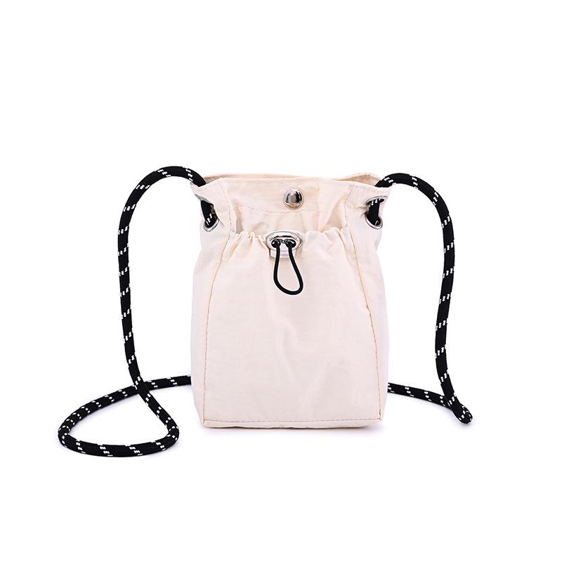 Lightweight Women's Nylon Crossbody Bag: Minimalist Japanese & Korean Style Coin Purse, Casual & Versatile.