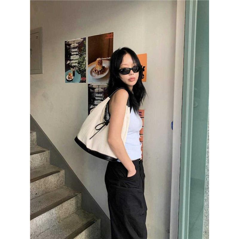 Niche retro black and white splicing canvas tote bag  new large-capacity versatile commuter portable shoulder bag women