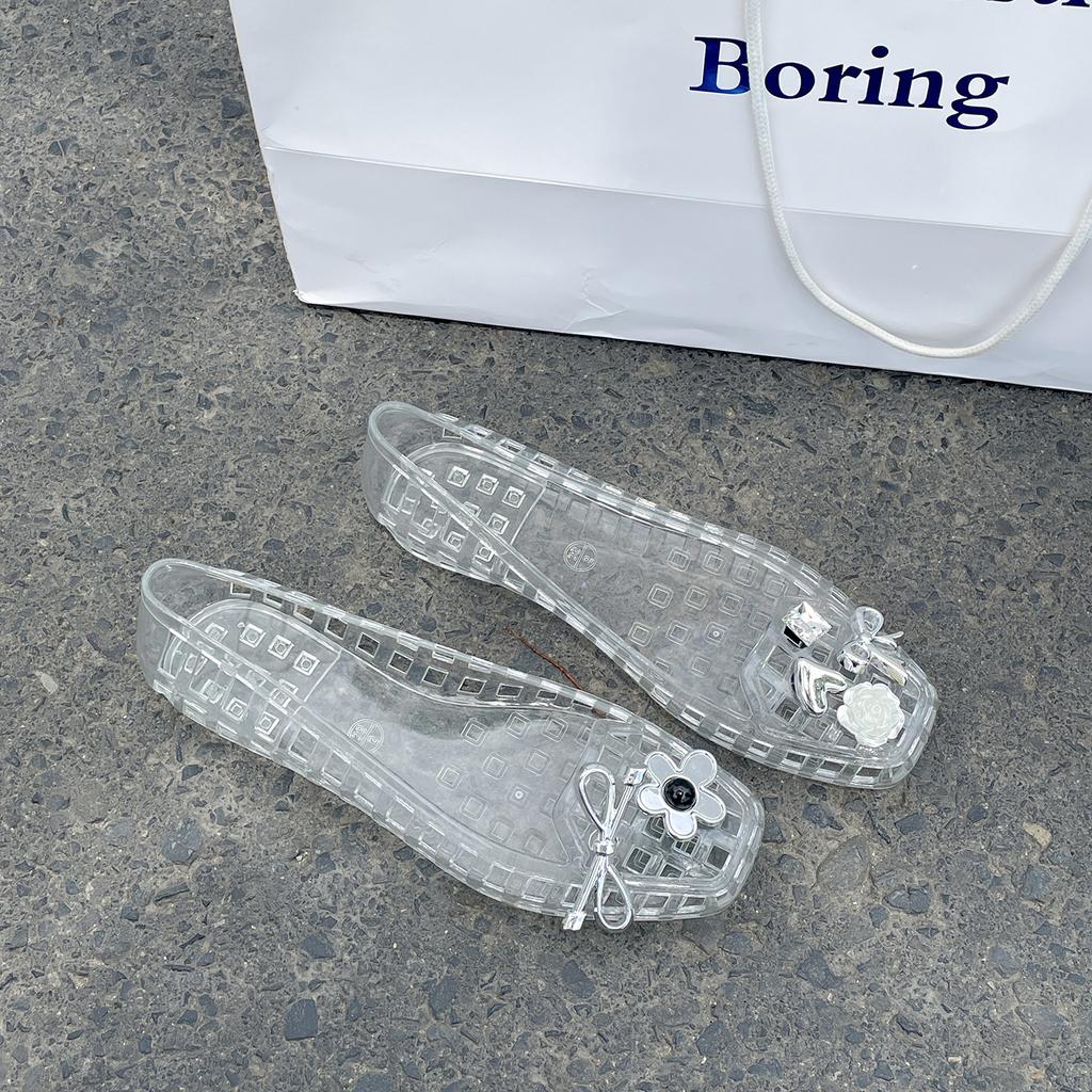 Retro popular black flat-bottomed bag head sandals women's 2025 new summer high-end Korean version crystal jelly shoes