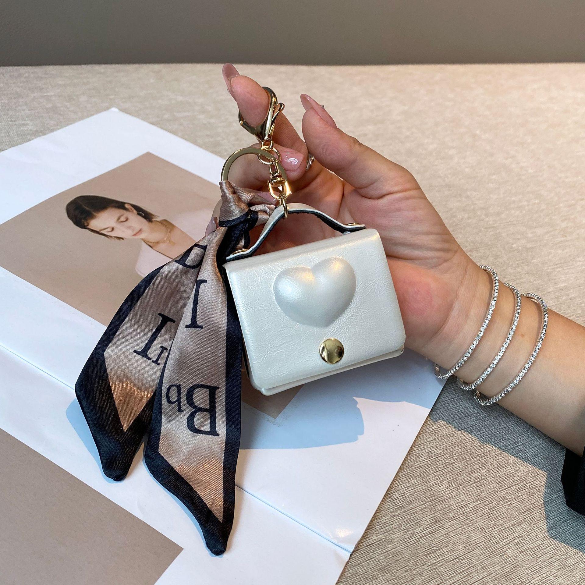

Internet celebrity new popular versatile exquisite change bag exquisite love embossed mini leather keychain bag hanging