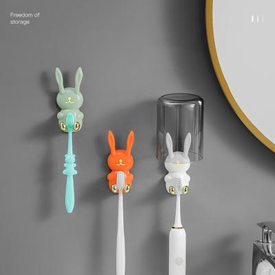 Porte-brosse à dents en forme de lapin de dessin animé Forte capacité de charge Facile à installer Crochet mural Organisateur de brosses à dents Décoration de salle de bain