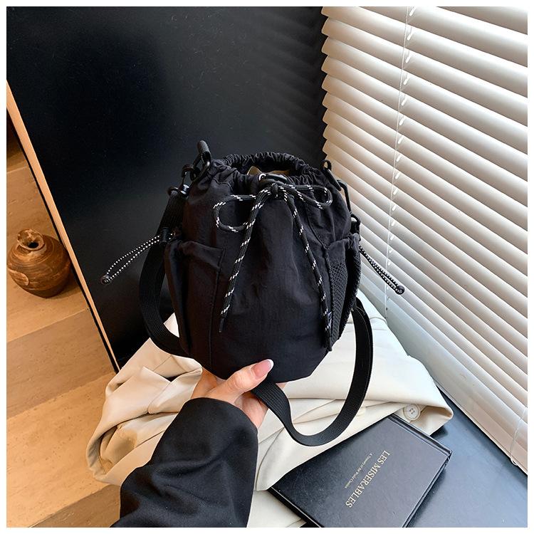 Canvas-Tasche Damen 2025 neue trendige Marke Handy-Tasche Freizeit Sport Reise Umhängetasche kleine Eimertasche