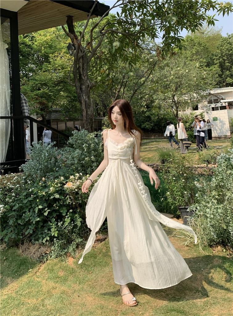 Holiday style flower design suspender dress women's 2026 summer new waist thin very fairy long skirt