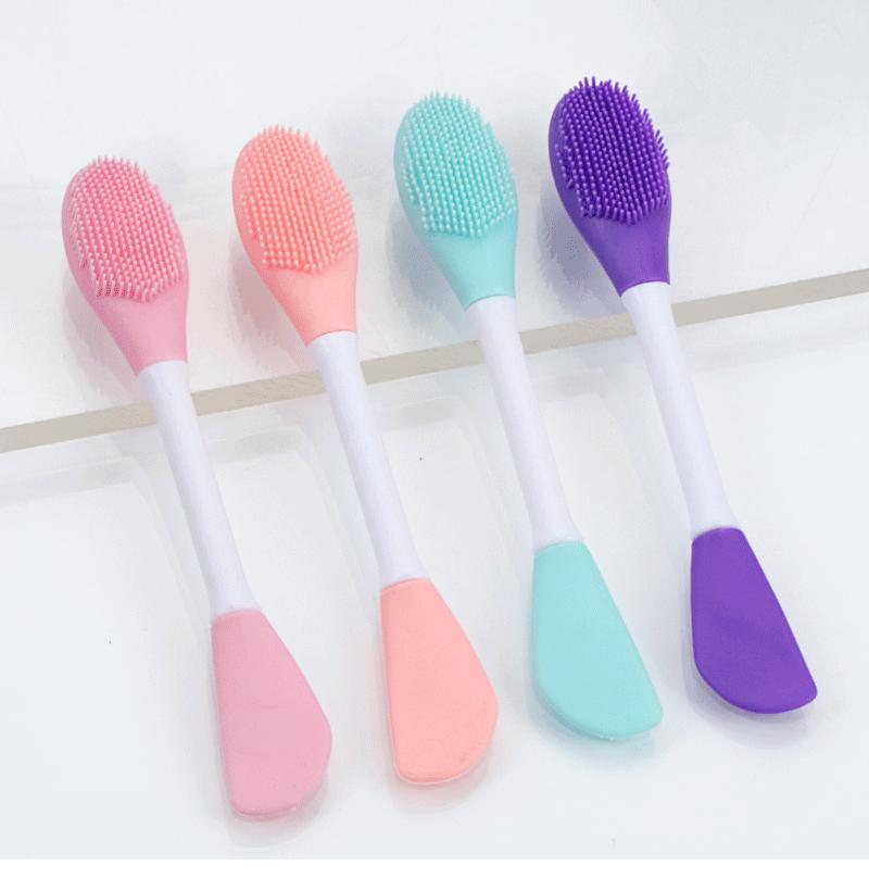 Doppelfunktionaler 2-köpfiger Silikon-Maskenpinsel für selbstgemachte Schlammmasken und Beauty-Make-up. Perfekt zum Verschmieren und Reinigen.