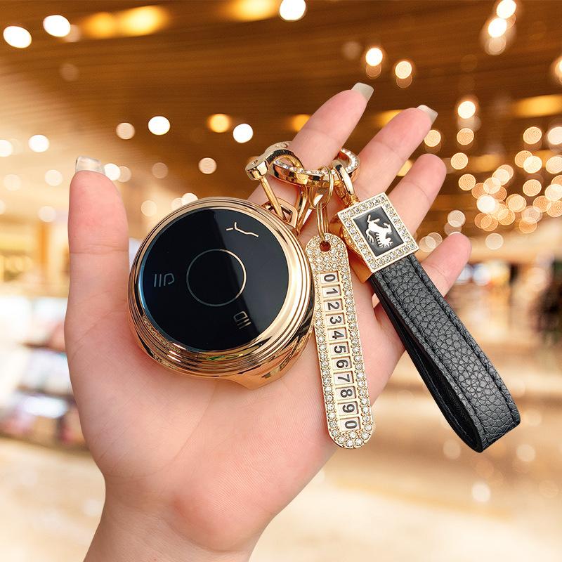 Applicable to Nezha V car Nezha U Pro key set bag, high-end protection, anti-drop personalized buckle, men's and women's new energy shell