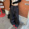 Retro American high street collision line design jeans women's autumn new Paris buckle loose versatile scimitar wide-leg pants