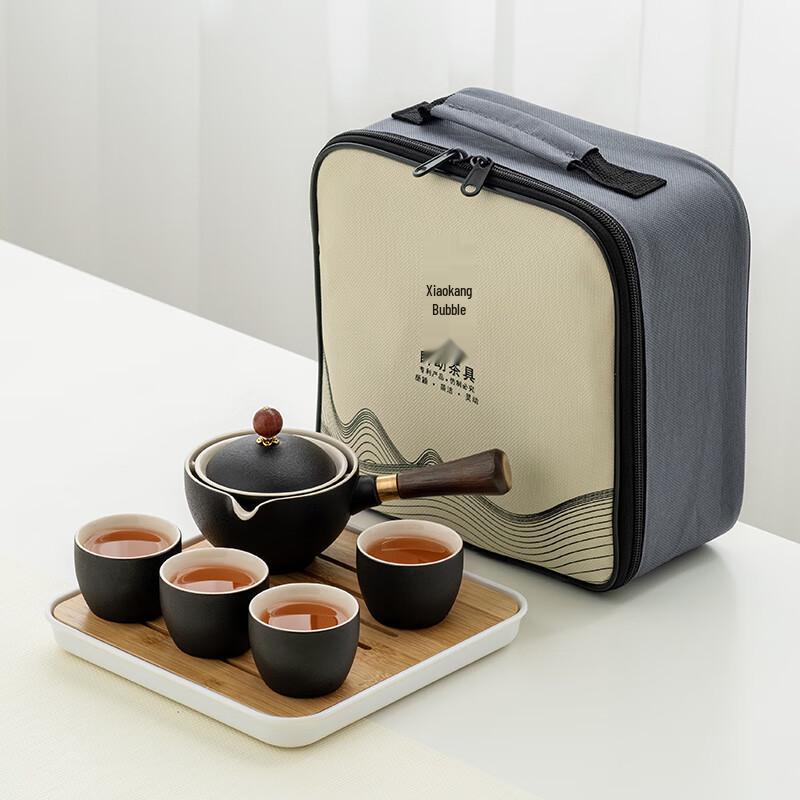 

Elegant Black Rotating Tea Set with Jade Inlay