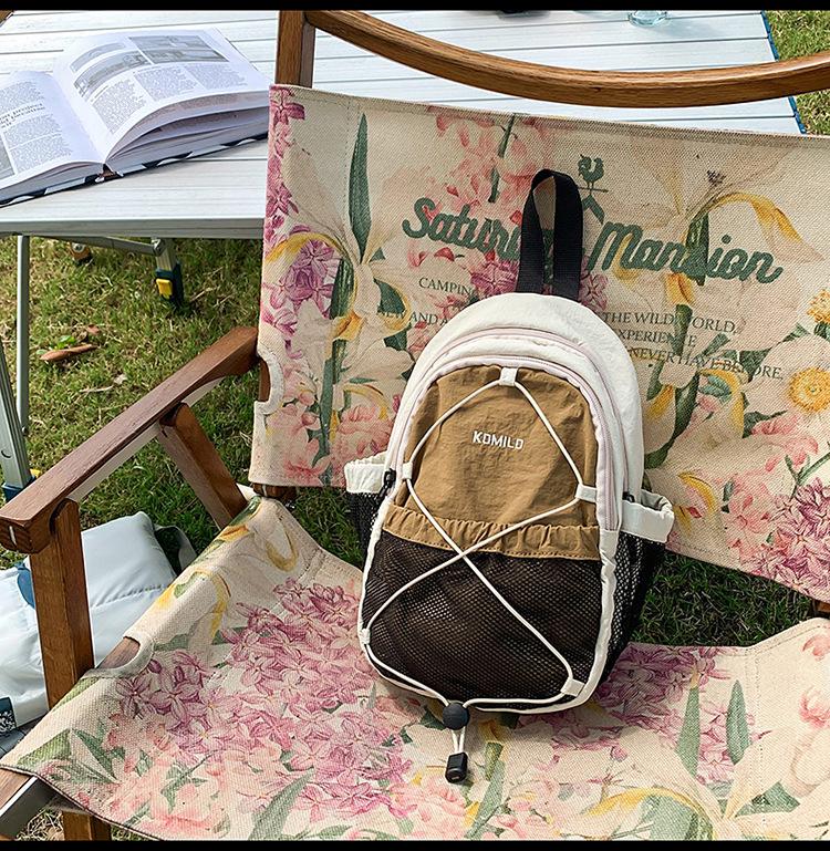 High-Value Color Block Mountain-Style Backpack - Lightweight, Large Capacity, Double Shoulder, Drawstring Design for Couples & Travel.